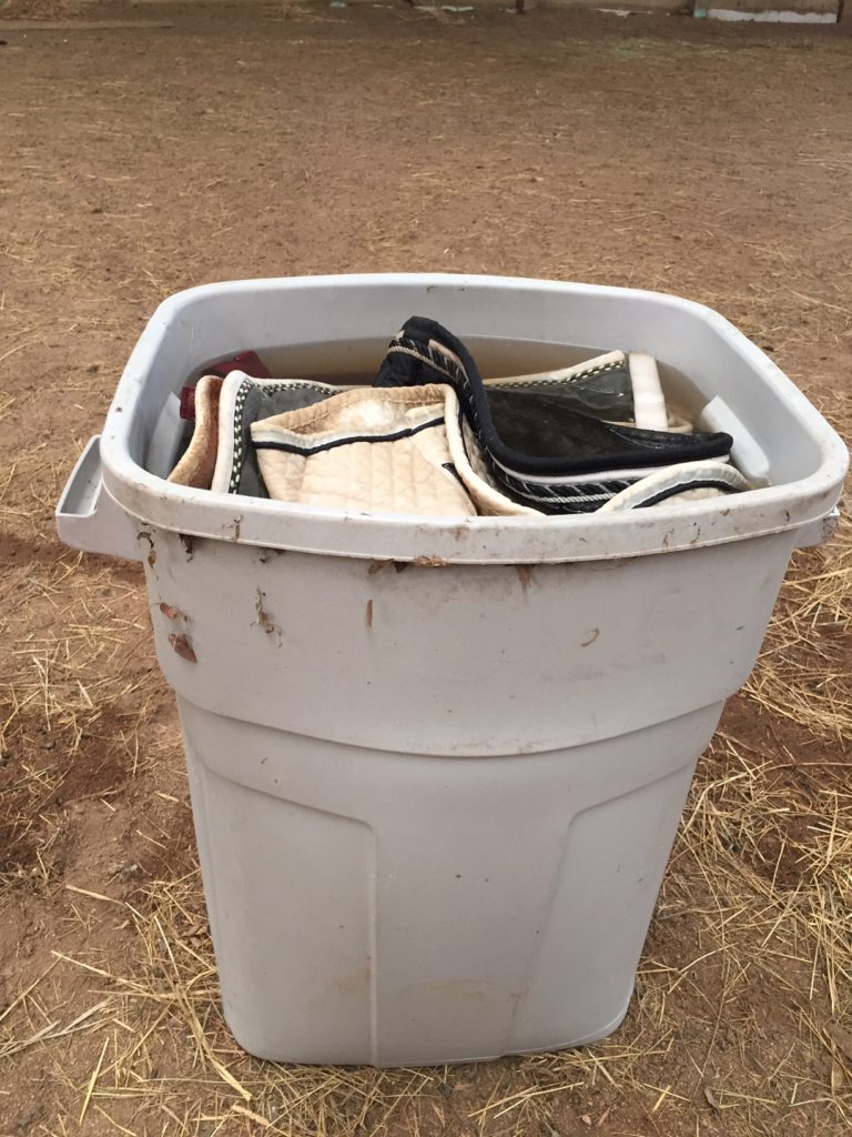 Soak your dirty saddle pads before trying to wash them
