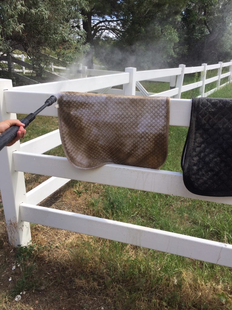 Pressure washing saddle pad